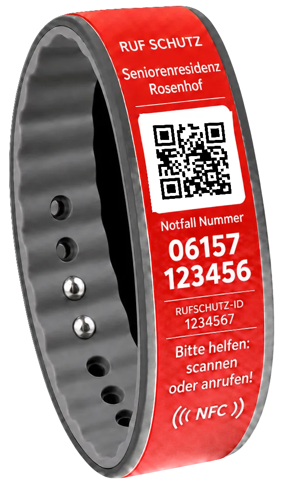 Beispiel-Schutzarmband in Rot mit dem Aufdruck Seniorenresidenz Rosenhof, einem scanbaren QR-Code, einer Notfallnummer und einer Rufschutz-ID. Der QR-Code führt zur Demo-Kontaktansicht einer Pflegeeinrichtung.